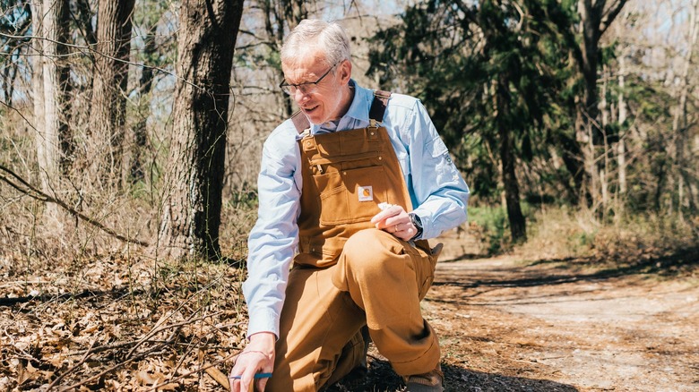 Dr. Thomas Mather checking for ticks