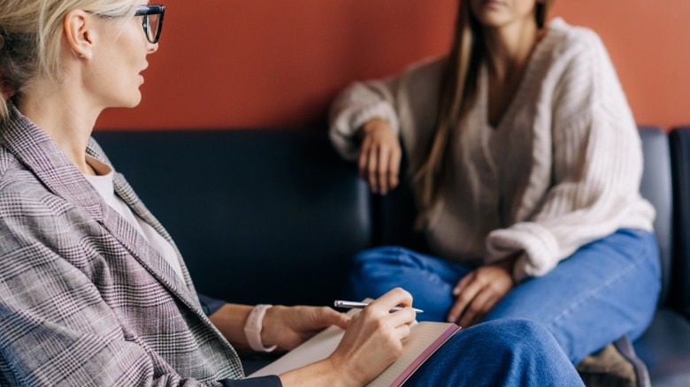 Woman talking to mental health professional