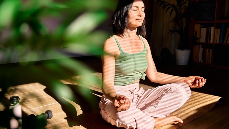 woman practicing yoga