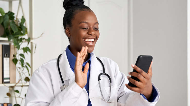 doctor talking to patient on phone