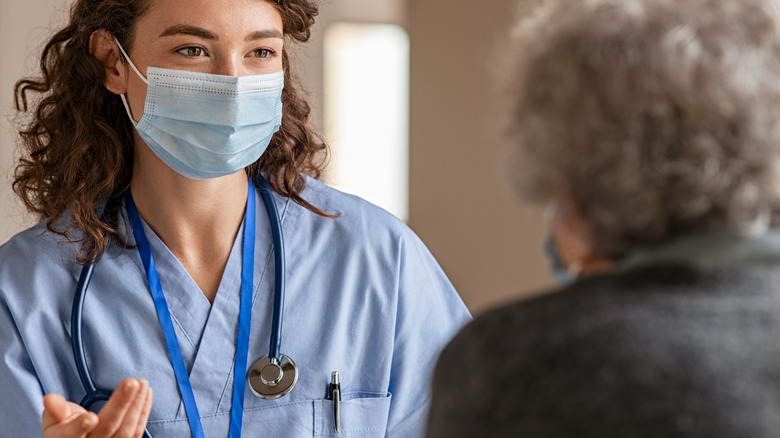 doctor talking to patient