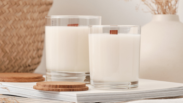 scented candles on white paper