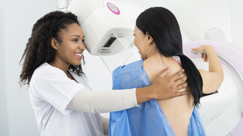 female patient getting a mammogram