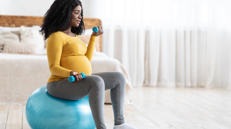 Pregnant person exercising