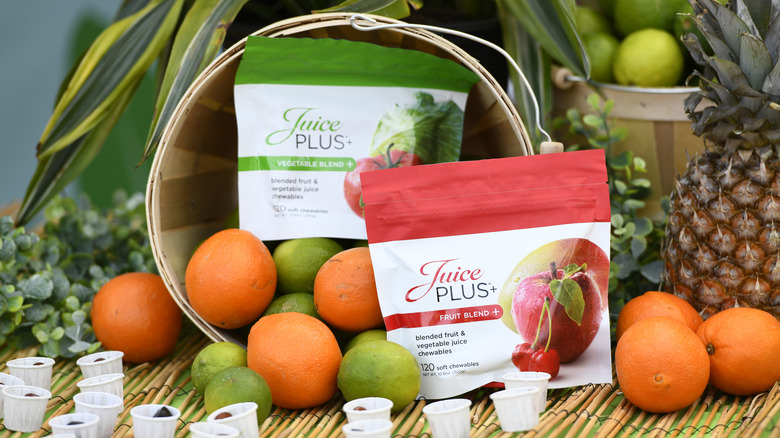 Juice Plus+ chewables surrounded by fruit