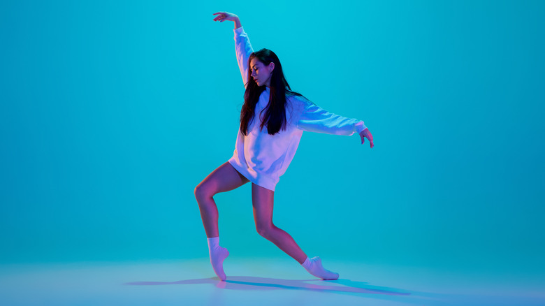 young woman dancing modern jazz ballet