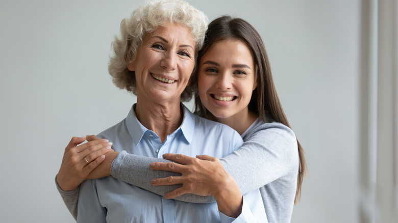 older mother and adult daughter