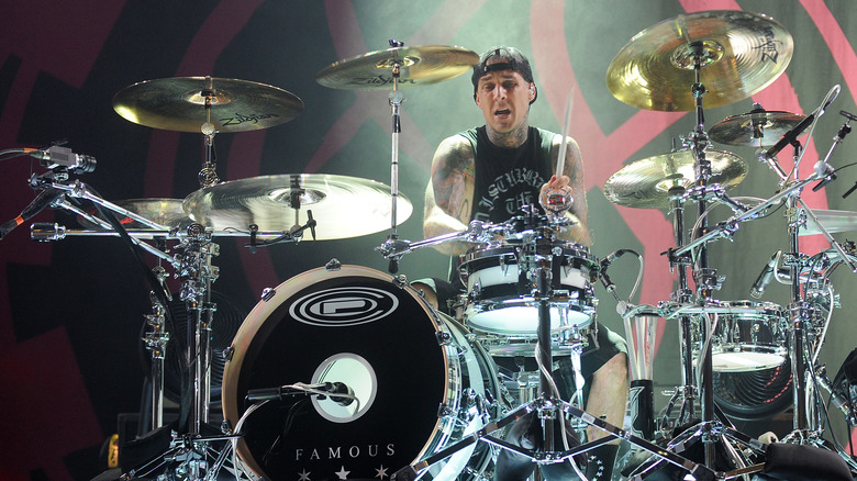 Travis Barker drumming on stage