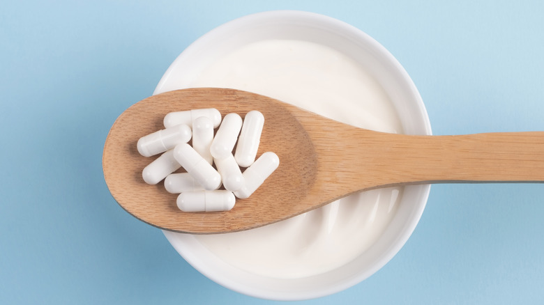 probiotic pills and probiotic-containing yogurt