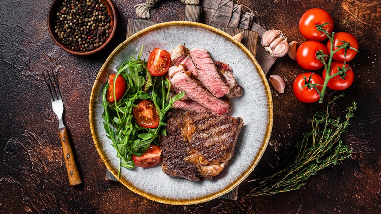 Plate of steak and salad