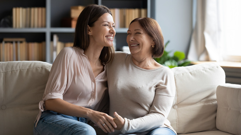 Mom and daughter laughing