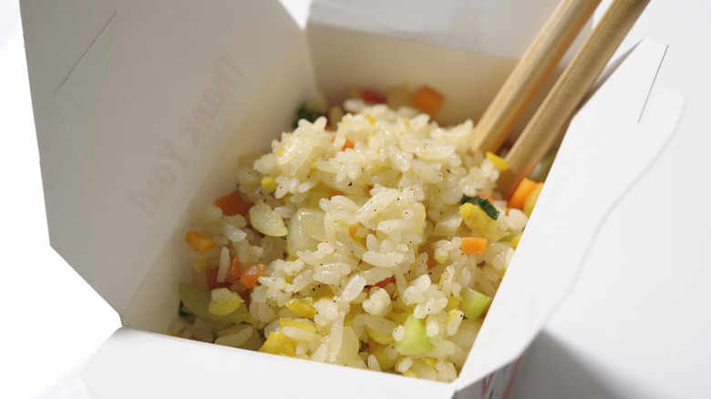 Fried rice in a takeout container