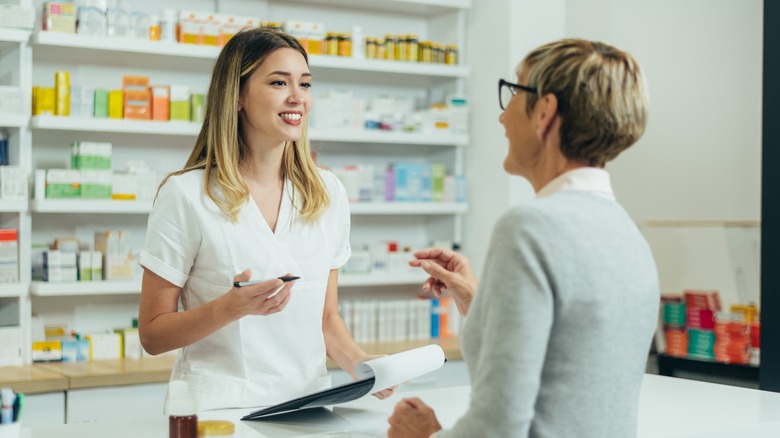 pharmacist advising patient 