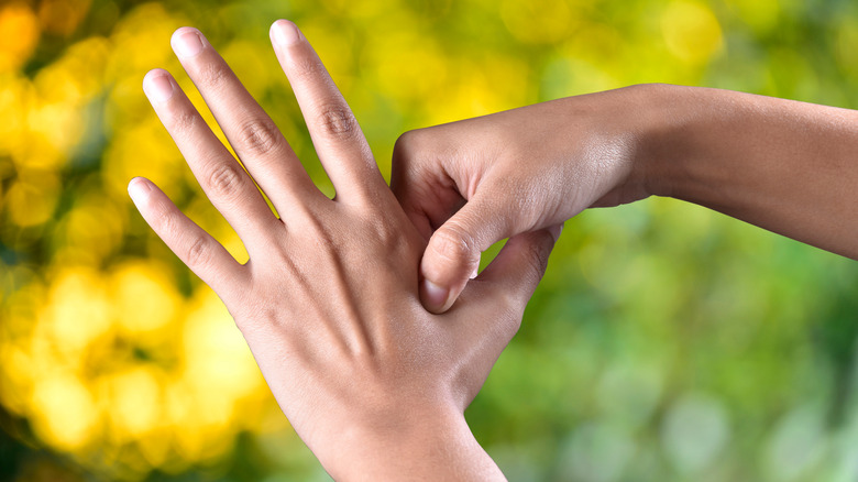 Acupressure on hand