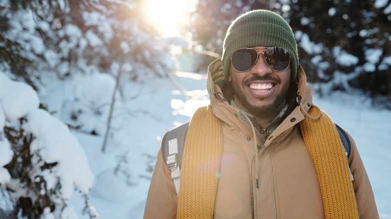 Man wearing sunglasses in winter