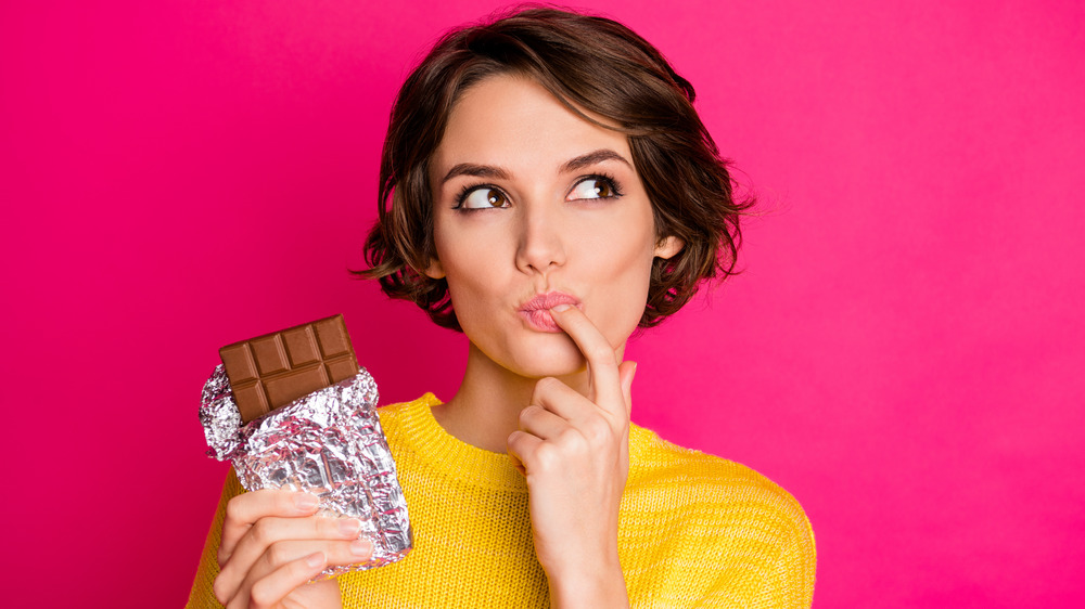 woman eating chocolate