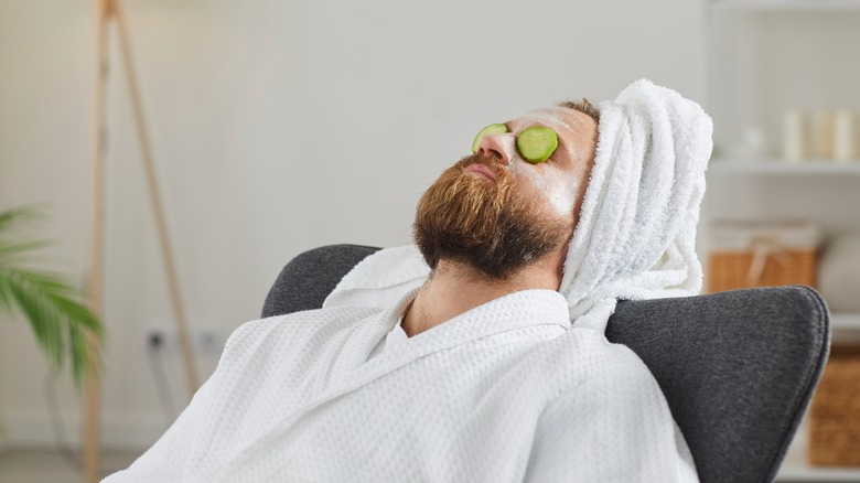 bearded man relaxing at spa