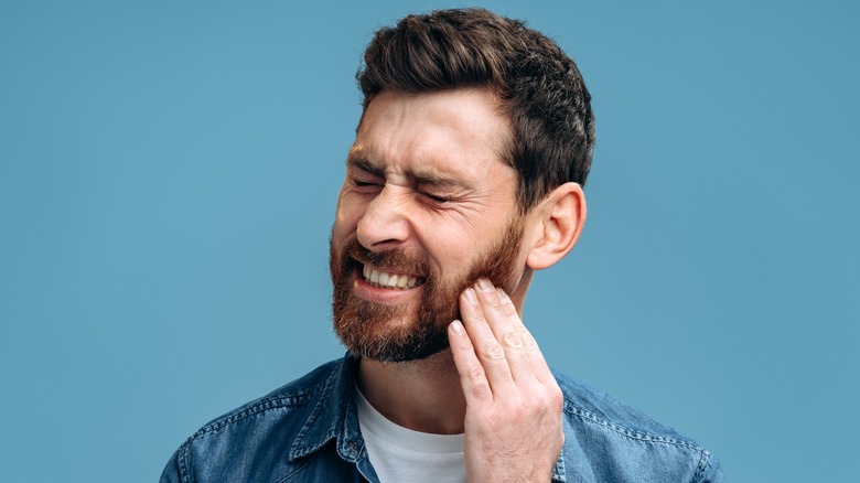 Man with TMJ pain