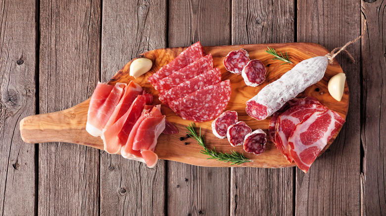 deli meats on serving board