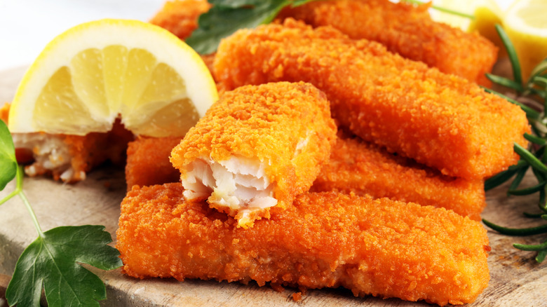 fish sticks on wooden board