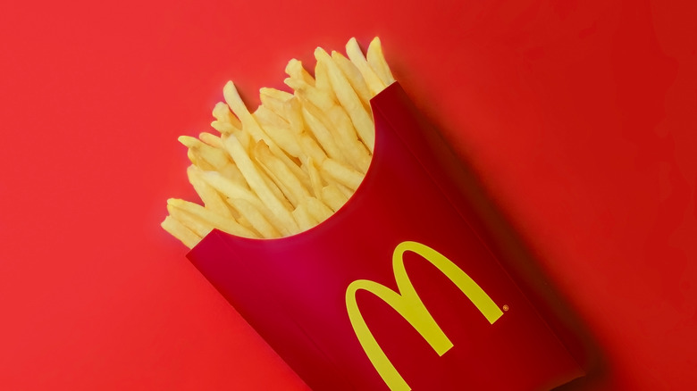 mcdonald's fries on red background