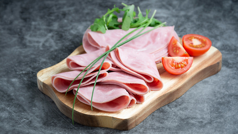 cold cuts on wooden board