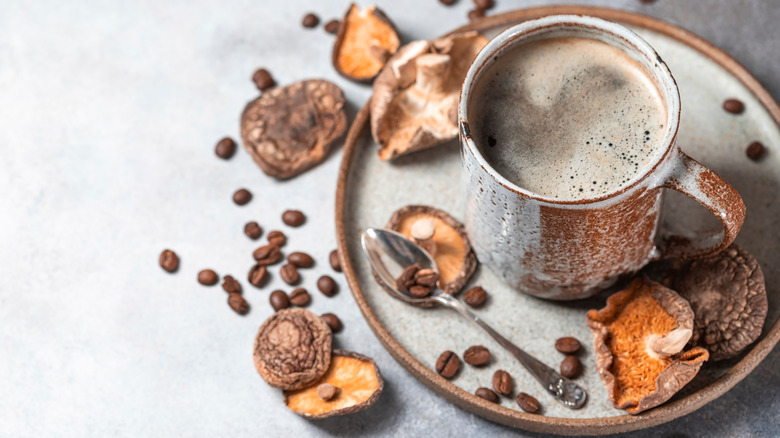 mushroom coffee with mushrooms around it