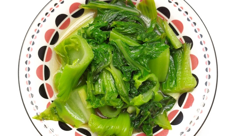 Cooked mustard greens on plate