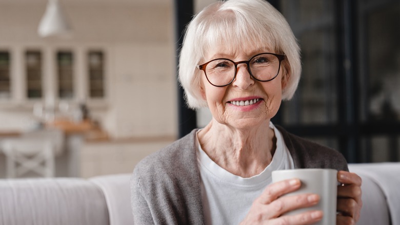older woman drinking tea