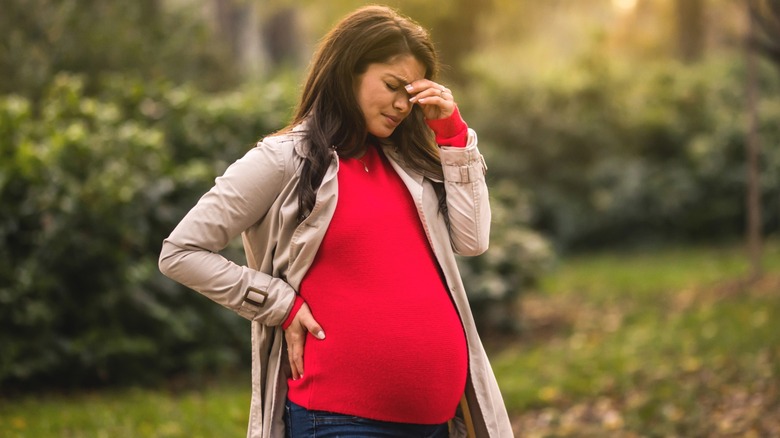 pregnant woman in anxious mood