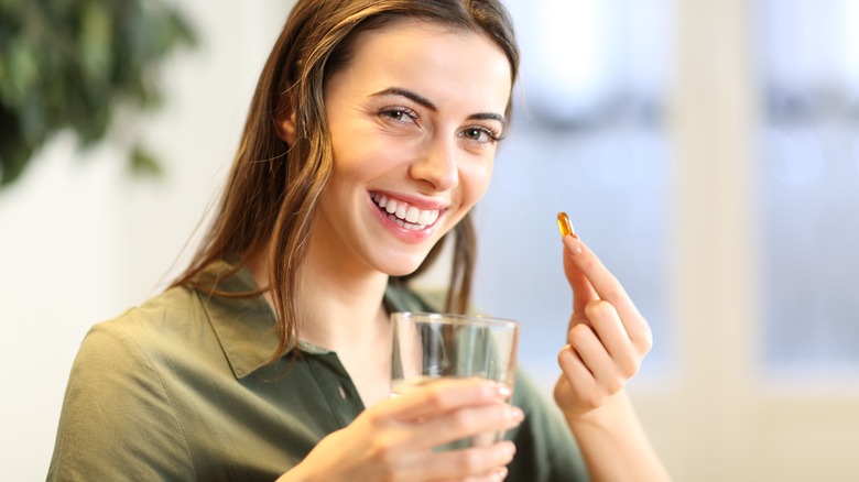 Woman taking medication