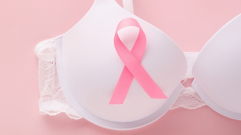 pink ribbon on white bra