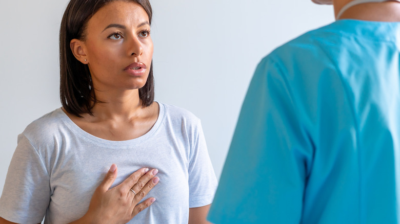 woman talking to doctor