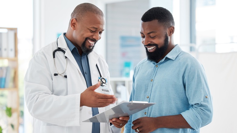 Man talking to his doctor