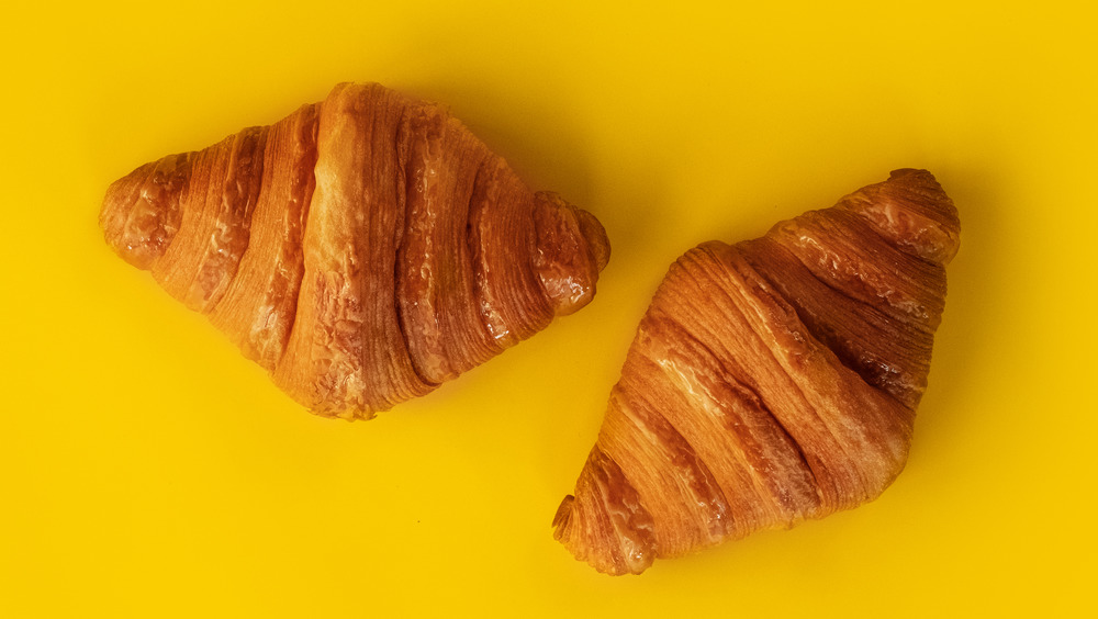 two freshly baked croissants