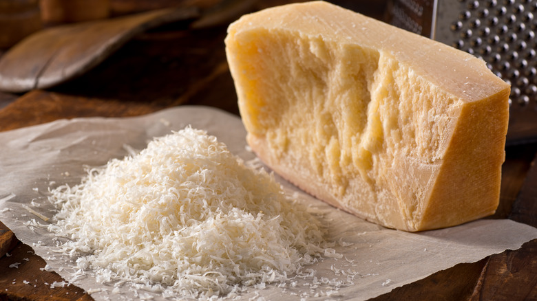 Solid and grated Parmigiano Reggiano cheese