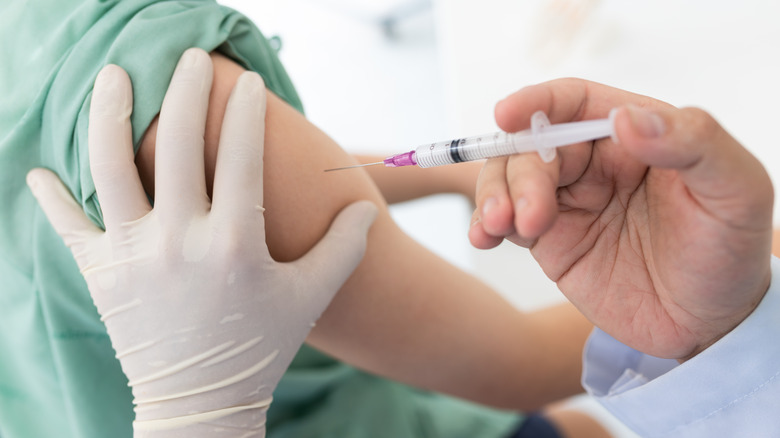 person getting a vaccine