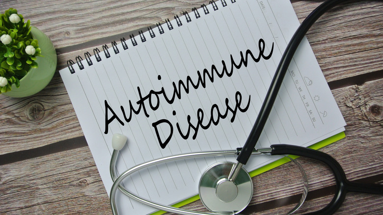 autoimmune disease written in script on a note pad