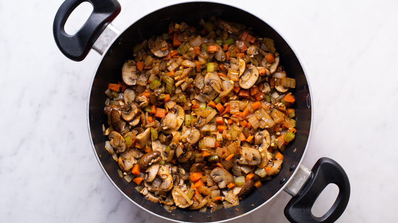 cooked vegetables in a saucepan