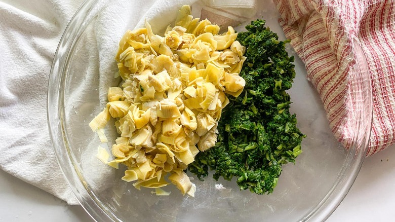 artichoke hearts and spinach in bowl