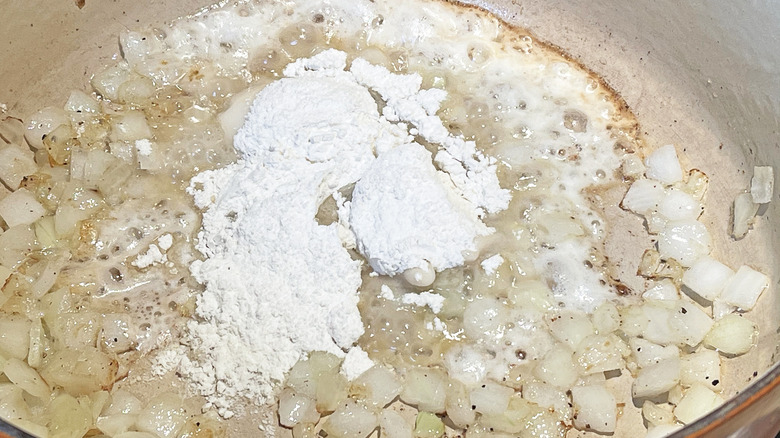 onion and flour in pan