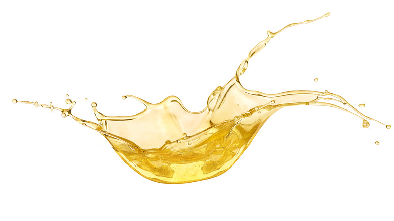 A drop of splashing olive oil