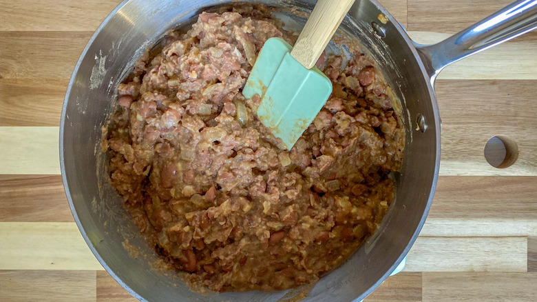 refried beans in pan