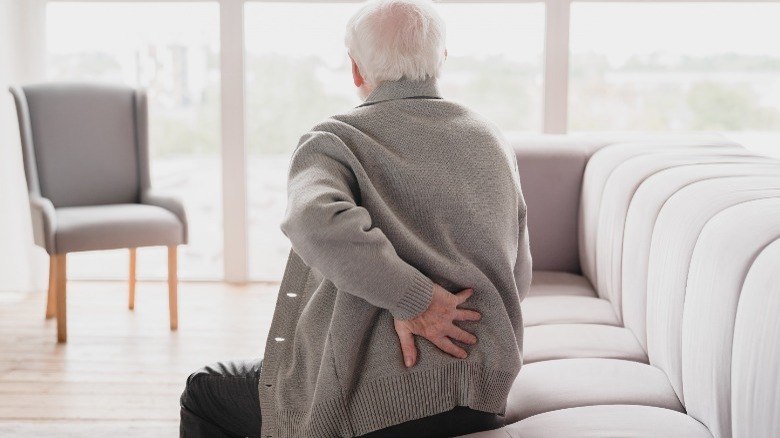 Elderly man with back pain