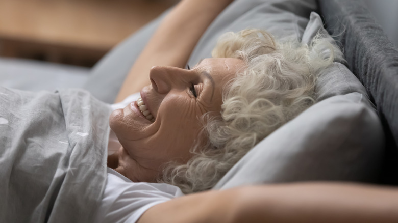 Happy woman waking up