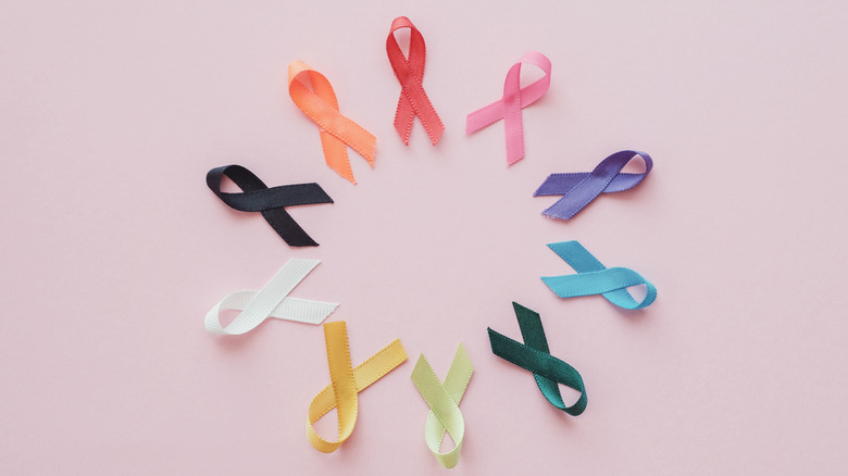 cancer ribbons on pink background