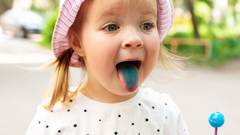 Girl with blue tongue