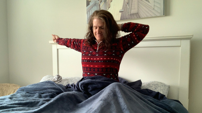 woman waking up in bed