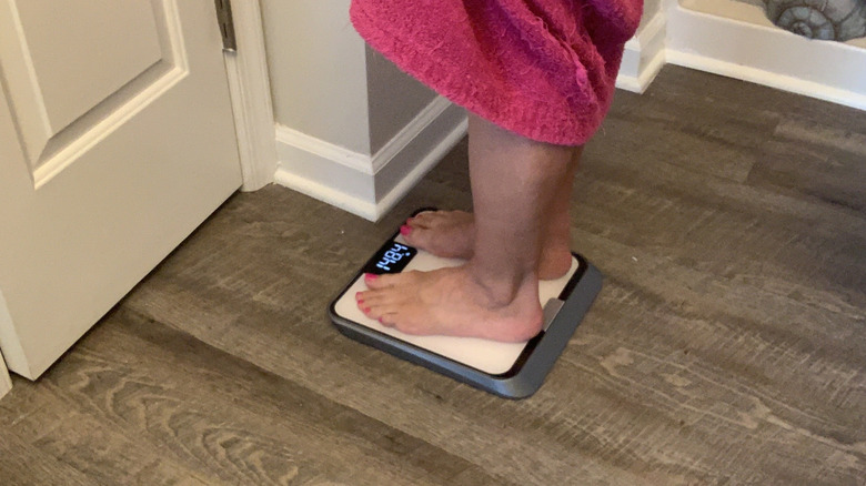 woman's feet on a scale