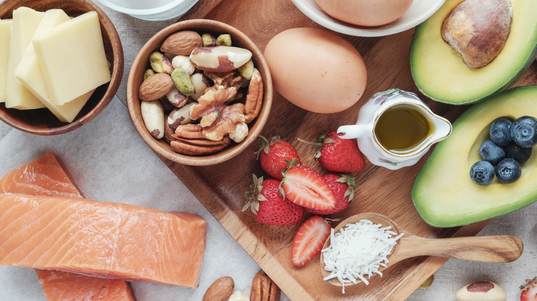 Fat-free foods in wooden cups and board